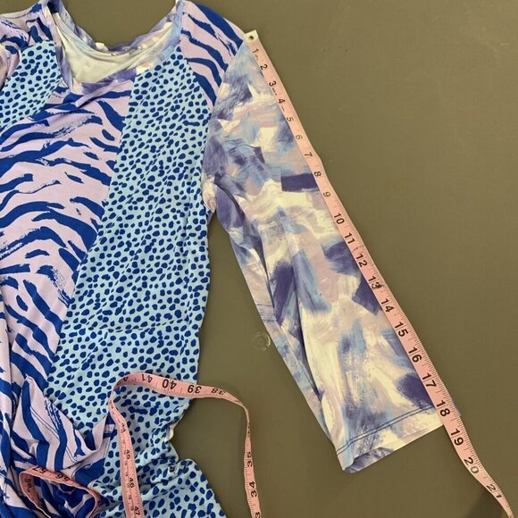 LOGO Lori Goldstein Womens L Tunic Top Sharkbite Hem Purple Animal Print Pockets - Picture 12 of 13